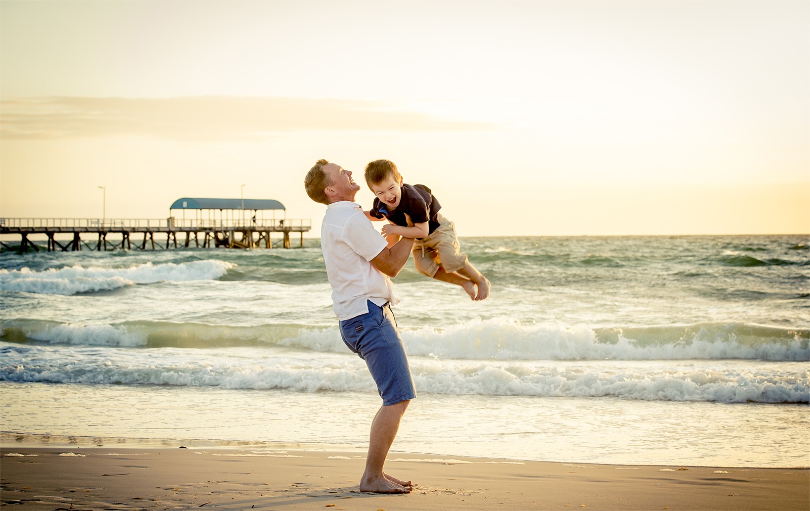 father-son-beach-happy